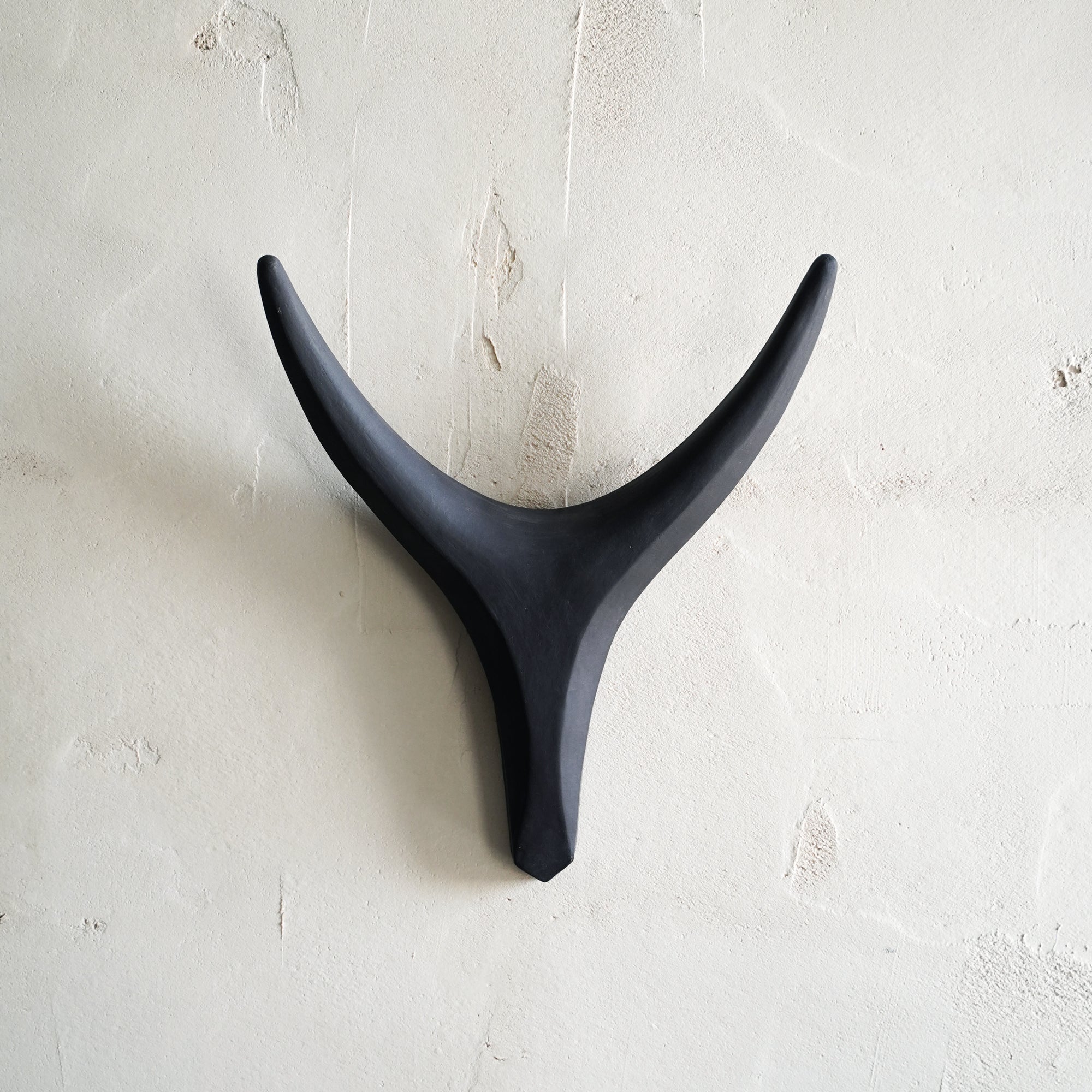Black ceramic antler wall sculpture, handmade modern wall decor.