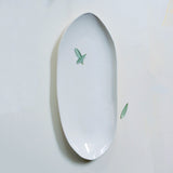aerial view of white elliptical platter