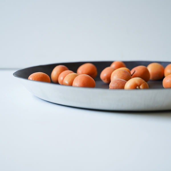 shallow tray with apricots
