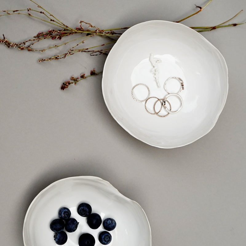 two white organic ceramic bowls